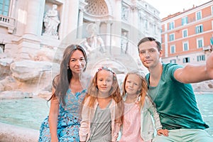 Family near Fontana di Trevi, Rome, Italy.