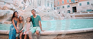 Family near Fontana di Trevi, Rome, Italy.