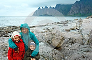 Family near summer Senja coast (Jagged Ersfjord, Norway, polar d
