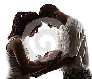 Family with newborn baby. Parents silhouette over white