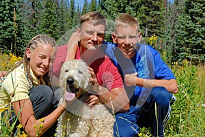 Family outdoor with dog