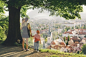 Family outdoors on background of Ljubljana, Slovenia, Europe