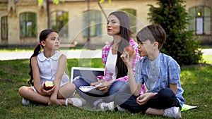 Family outdoors on home adducation lesson