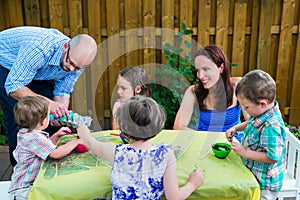 Family Painting Easter Eggs