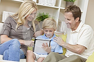 Family Parents & Boy Son Using Tablet Computer