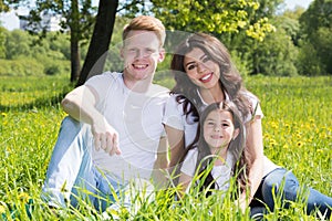 Family on park meadow