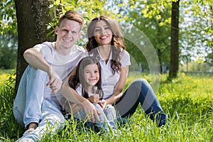 Family on park meadow