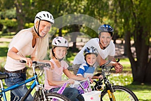 Family in the park with their bikes