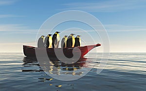 Family penguins. Group of penguins on a red boat in the ocean