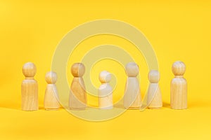 Family people figures on yellow background. Concept of family, values, unity, togetherness