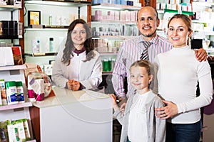 Family in a pharmacy