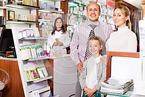 Family in the pharmacy