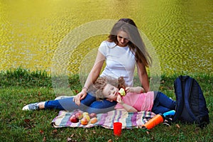 Family picnic. Mother and daughter