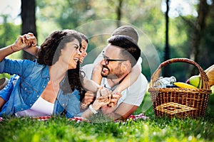 Family picnic outdoors togetherness relaxation happiness concept