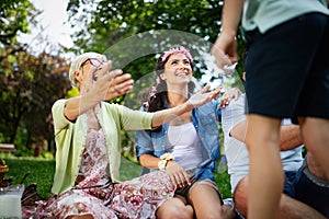 Family picnic outdoors togetherness relaxation happiness concept