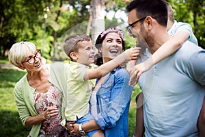 Family picnic outdoors togetherness relaxation happiness concept