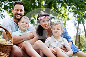 Family picnic outdoors togetherness relaxation happiness concept