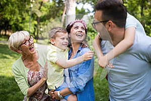 Family picnic outdoors togetherness relaxation happiness concept