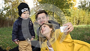 Family picnicking in the park.