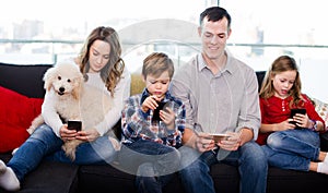 Family plaing with mobile phones