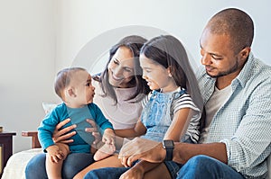 Family playing with baby