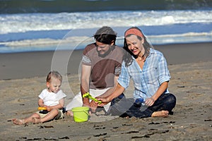 Family playing beach