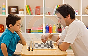 Family playing chess