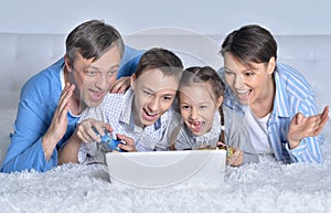 Family playing computer games