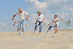 Family playing football