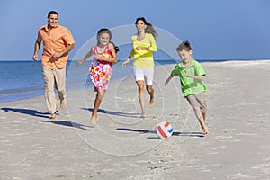 Family Playing Football Soccer on Beach