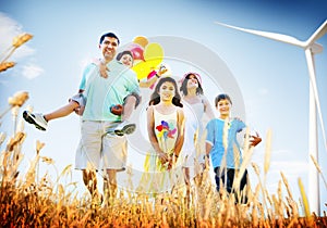 Family Playing Outdoors Children Field Concept