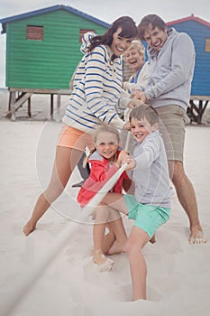 Family playing tug of war