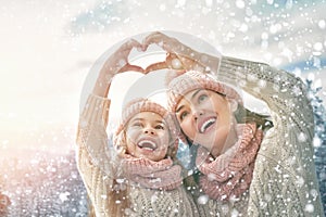 Family playing on winter walk