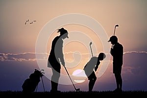 Family plays golf
