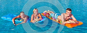 Family in the pool photo