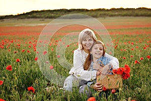 Family in poppy field