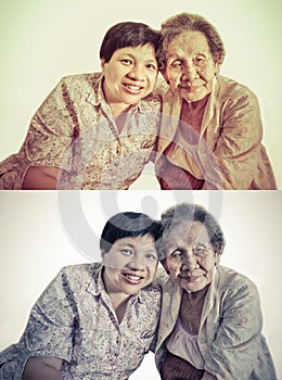 Family Portrait of an Asian elder mother and daughter hugging in