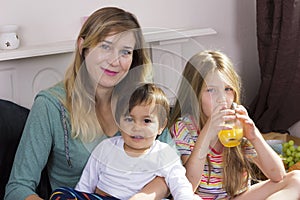 Family portrait in bed at home