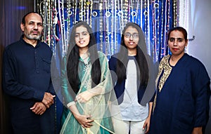 Family portrait celebrates Indian festival Diwali.