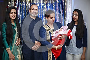Family portrait celebrates Indian festival Diwali.