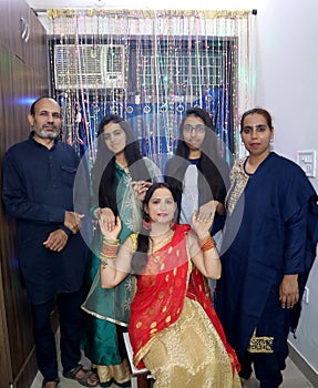 Family portrait celebrates Indian festival Diwali.