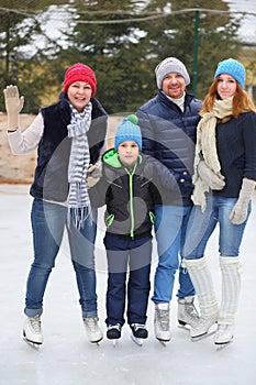 Family portrait of four people in skating