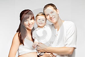 Family Portrait, Happy Smiling Mother Father Child ove White