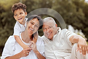 Family, portrait and relax at a park with grandparents and grandchild playing, laughing and bond in nature. Love, happy