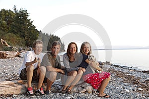 Family portrait on a rocky coastal beach