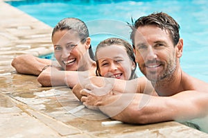 Family portrait in swimming pool