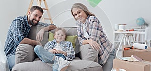 Family posing in their new house