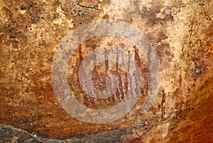 Family in prehistoric bushman's rock pictograph