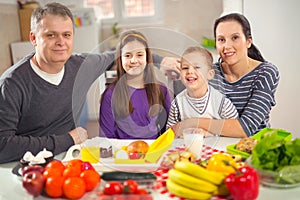 Family preparing meal. Mealtime together at home