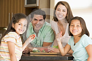 Family Preparing A Meal Together